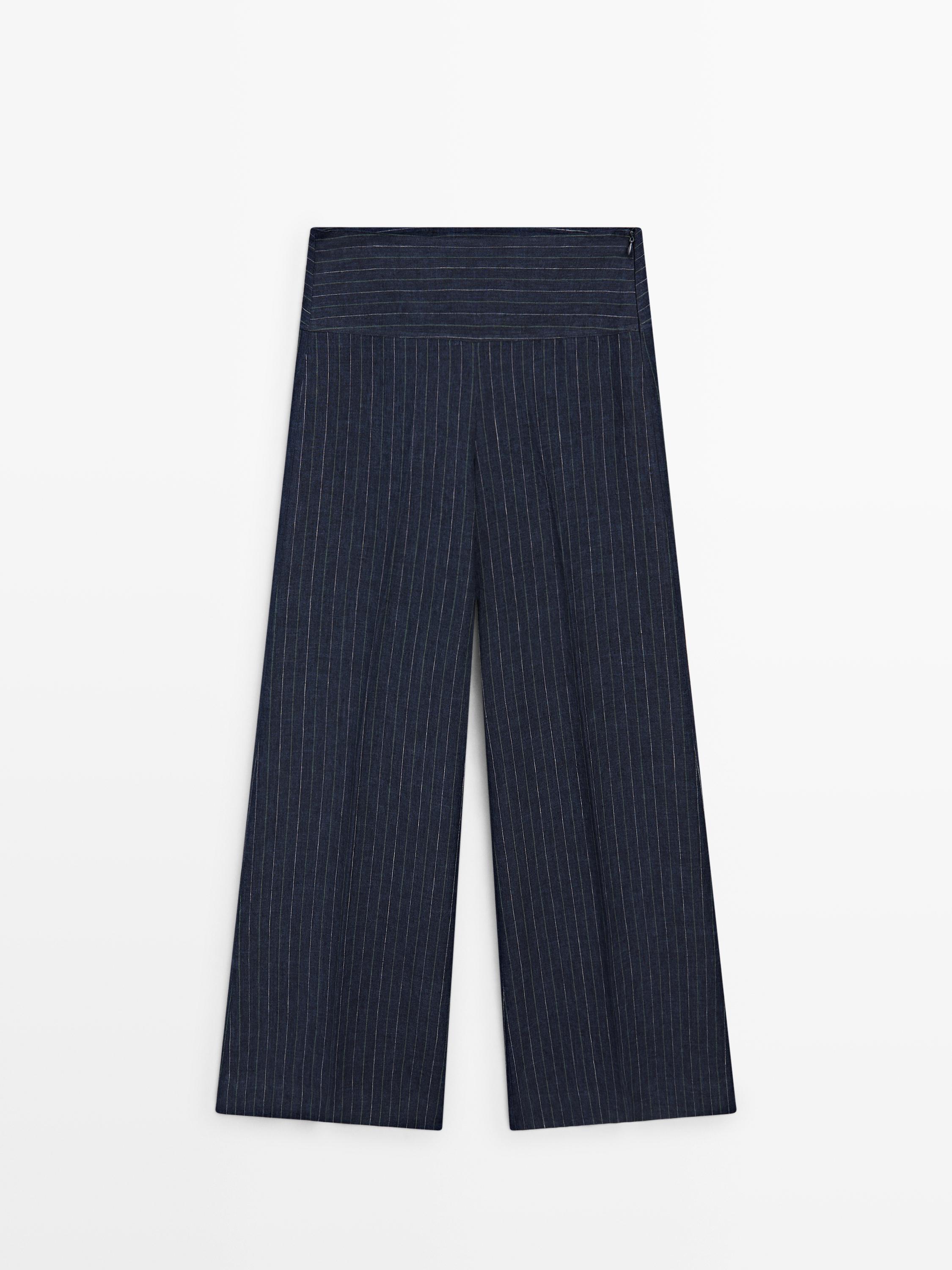 Flare fit linen trousers with striped details